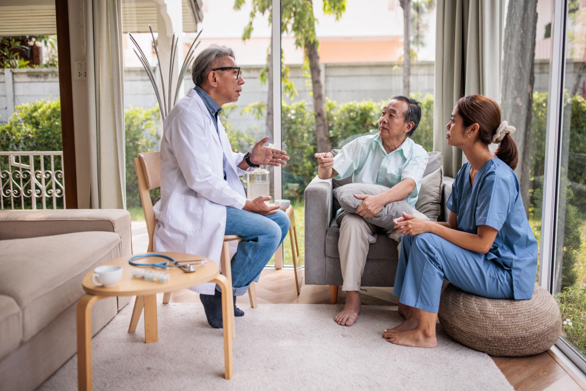 Home healthcare professional with patient